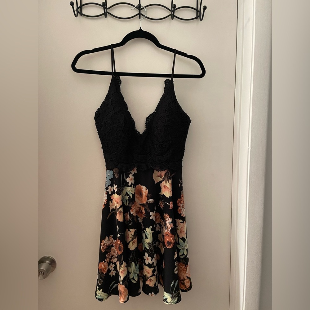 Floral mini dress with lace top.